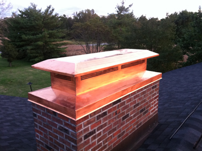 Before and after chimney cap replacement in Lindenhurst, NY