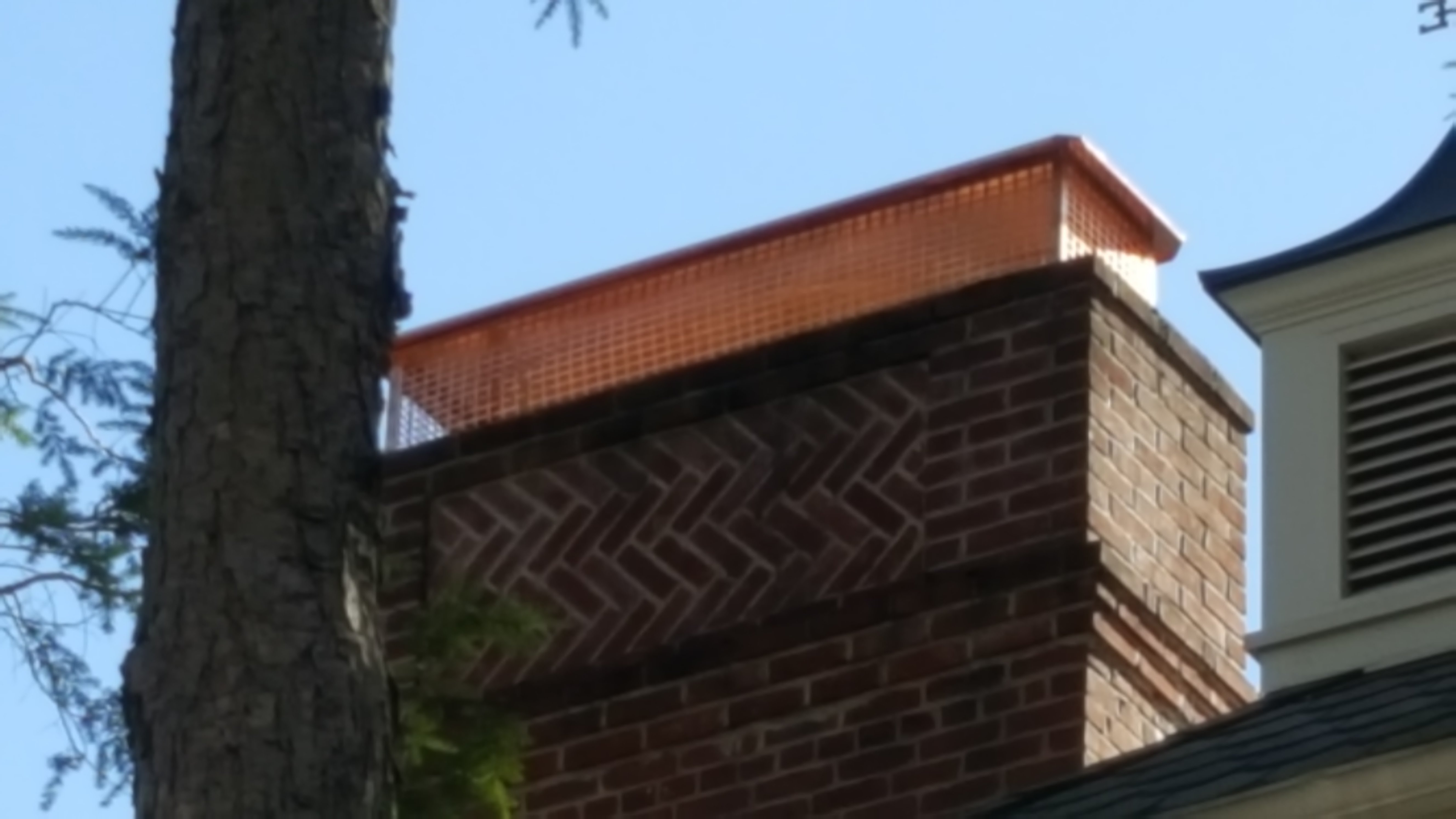 New stainless steel chimney cap installed in Lindenhurst, NY