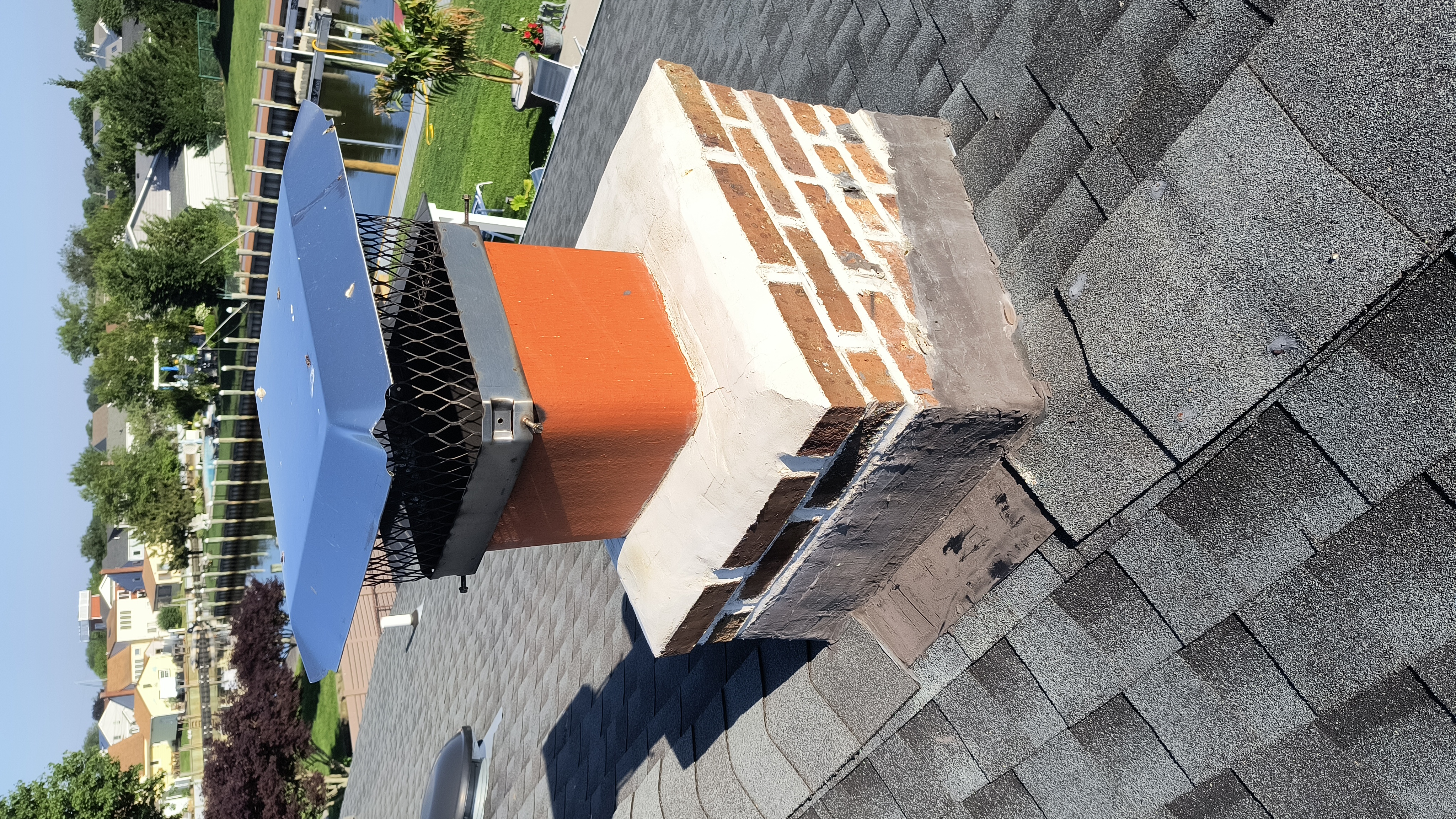 Full chimney masonry rebuild and restoration in Lindenhurst, NY