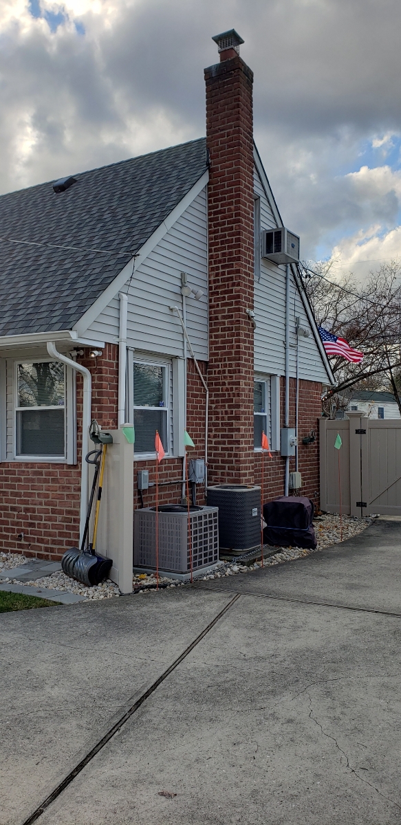 Professional chimney repointing restoring brick joints in Lindenhurst, NY